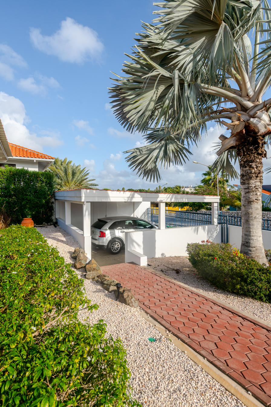 Gated driveway with parking for two cars